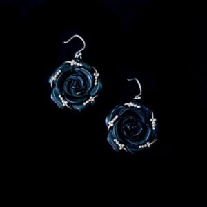 carved rose silver and black onyx earring